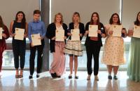 Spring 2022 inductees to Glenville State University’s Kappa Omicron chapter of international education honor society Kappa Delta Pi (l-r) Abigail Taylor, Madison Shepherd, Heather Sears, Emily Lewis, Cameron Knopp, Samantha Hall, Myrtle Copen, and Stormie Alverson. (GSU Photo/Dustin Crutchfield)