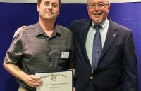 Glenville State College Staff Employee of the Year Jason Gum (left) with John Beckvold