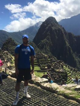 GSC Student with Machu Picchu behind him