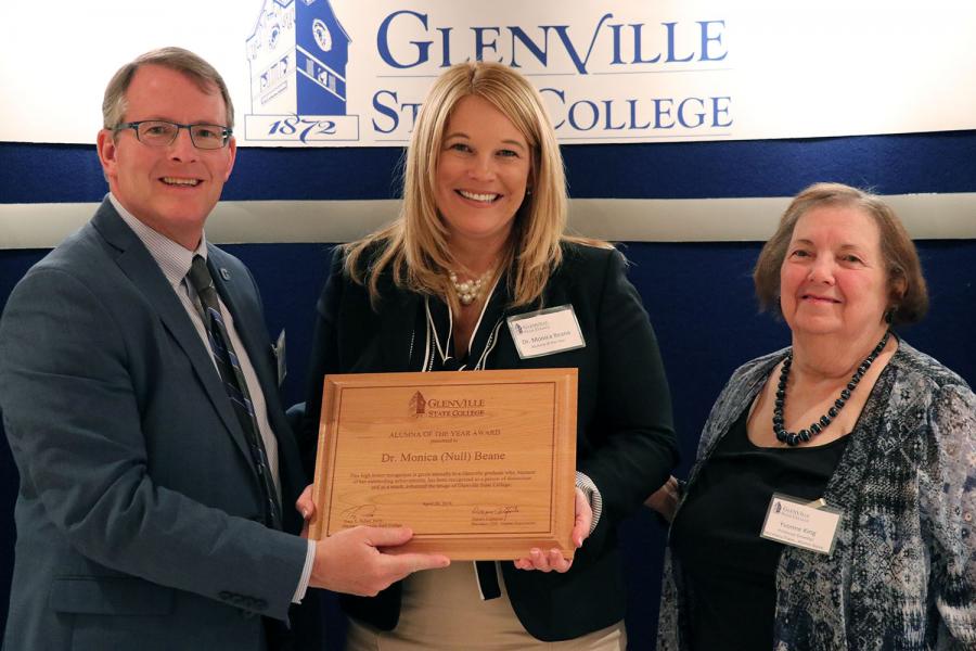 Alumna of the Year Monica Beane with President Pellett (left) and award presenter Professor Emerita Yvonne King (right)