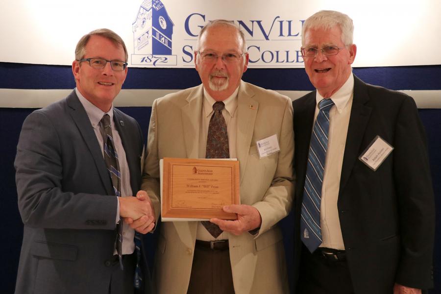 Community Service Award recipient Bill Frost with President Pellett (left) and award presenter Ralph Holder (right)