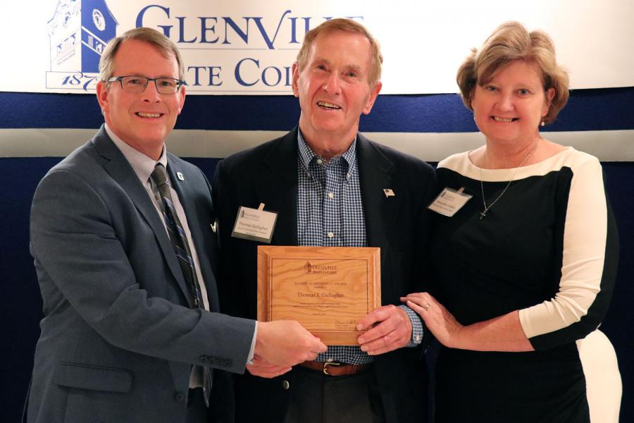 Alumni Achievement Award recipient Thomas Gallagher with President Pellett (left) and award presenter Maureen Gilden (right)