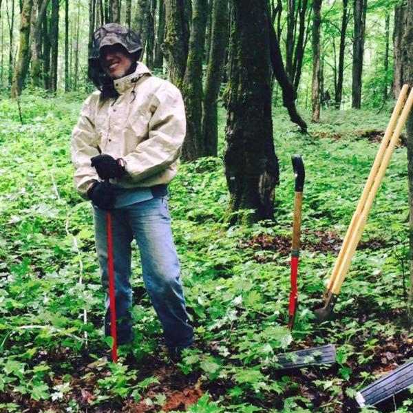 GSC student Sam Canfield in a sugar maple forest on land near the University of Notre Dame Environmental Research Center