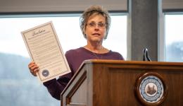 Rita Hedrick-Helmick, Vice President for Administration at Glenville State University, holds a copy of the resolution proclaiming November 30, 2022 as Pancreatic Cancer Awareness Day at Glenville State University. (GSU Photo/Kristen Cosner)