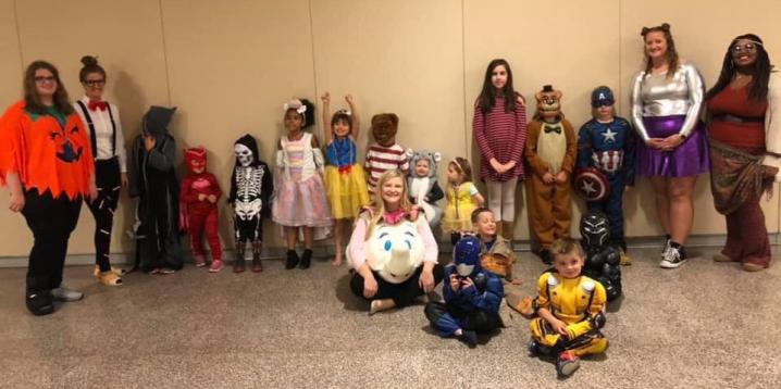 EESG members and young children in costumes
