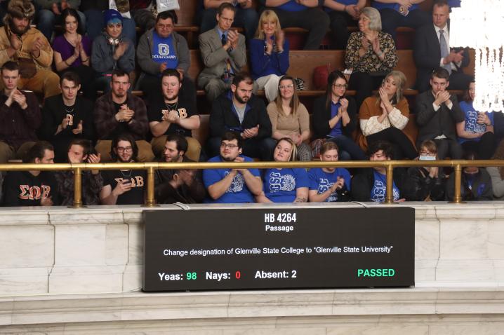 Glenville State students, faculty, and staff applaud the passage of House Bill 4264, which officially changed the designation of the institution from Glenville State College to Glenville State University. 