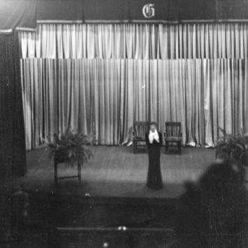 In this low-quality archival photo from 1936, Amelia Earhart is pictured on the stage at what was then known as Glenville State Teachers College (now Glenville State College).