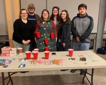 Pioneers for a Cause members participating in the Holiday Celebration