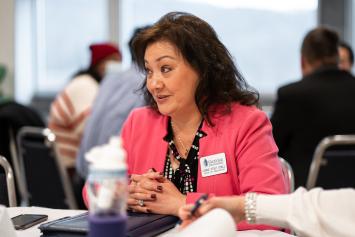 Connie Stout O’Dell, Dean of Education at Glenville State University, chats with other attendees during a meeting of faculty and staff from Marshall University and Glenville State on January 20. (GSU Photo/Kristen Cosner)