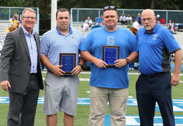 Rob Smith and Jimmy Mullins accept the Halftime Heros award