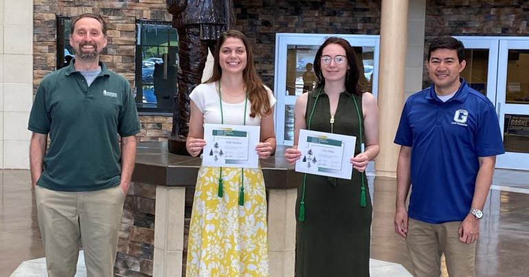 (l-r) Glenville State University Department of Land Resources Associate Professor of Forestry Dr. Brian Perkins, Della Moreland, Ciera Heine, and Chair Dr. Rico Gazal. Moreland and Heine are Forest Technology students at Glenville State University who were recently named to the CEFTS Honor Society.