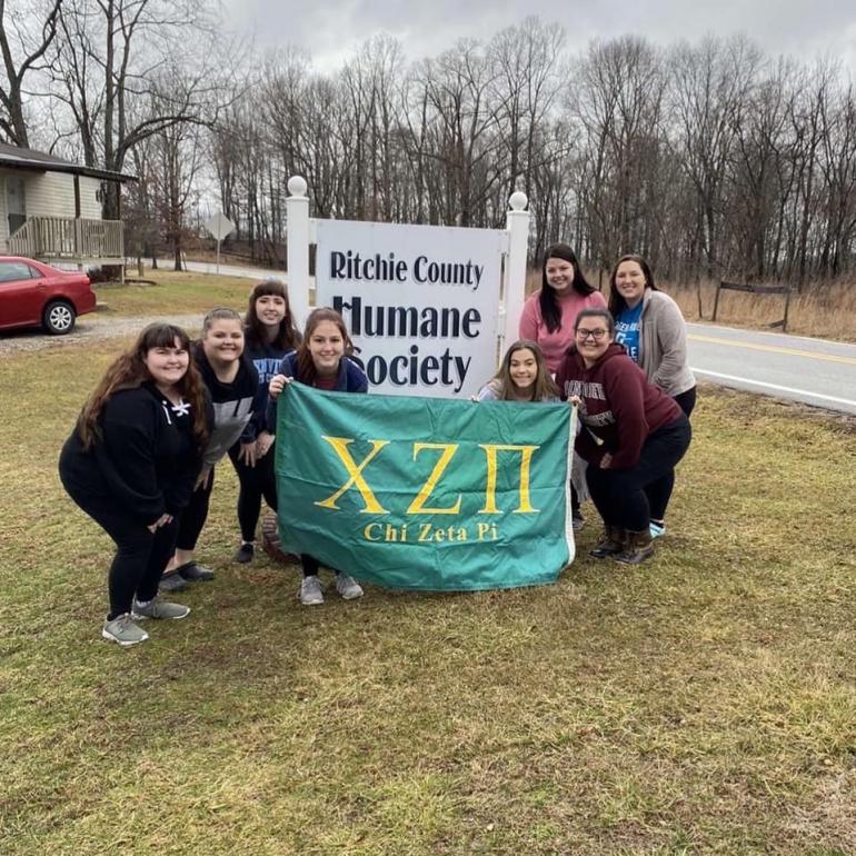 Members of the Glenville State College sorority Chi Zeta Pi who visited the Ritchie County Humane Society for a community service outing; (l-r) Dezarae Detamore, Kimmy Little, Miranda Hinkle, Kayla Hall, Brooke Spencer, Faith Norris, Macy Rush, and Christina Frazier (not pictured Raeann Sickles) | Photo provided by Chi Zeta Pi