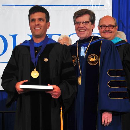Dr. Jonathan Minton with President Barr