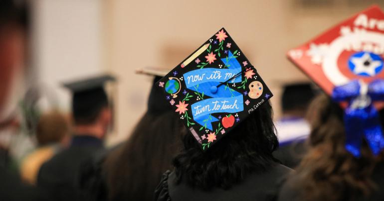 The decorated cap of Glenville State University graduate Haley Cottrill, pictured here at the spring commencement ceremony in May 2021, stands out among a sea of Pioneer graduates. The spring 2022 ceremony will take place on Saturday, May 7 at 10:00 a.m. in the Waco Center.