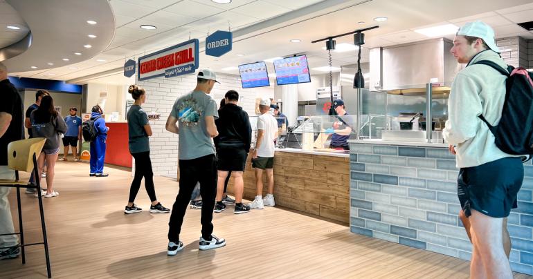 Dining Renovations - Cedar Creek Grill Students wait to pick up their orders at the newly opened Cedar Creek Grill inside the Mollohan Campus Community Center at Glenville State University. (GSU Photo/Kristen Cosner)