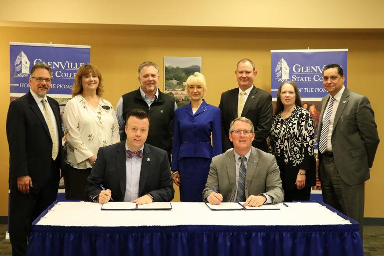 At the Articulation Agreement signing (l-r) seated: Michael Waide and Dr. Tracy Pellett; standing: Kenneth Lang, Amy Cunningham, Robert "Denny" Mills, Cheryl McKinney, David Beighley, Kari Coffindaffer, and Dr. Gary Morris