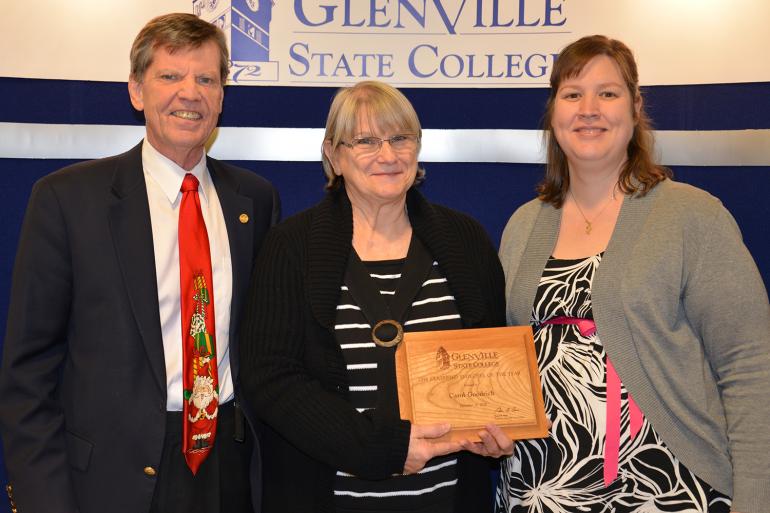 Glenville State College President Dr. Peter Barr (left) and Classified Staff Council Vice President Rachel Adams (right) with 2016 Classified Employee of the Year Carol Goodrich