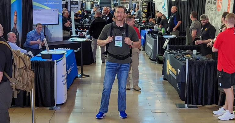 Glenville State University Assistant Professor of Criminal Justice Dr. Donal Hardin stands among the booths at the 2022 International Law Enforcement Educator and Trainers Annual Conference. The conference was held in St. Louis, Missouri.