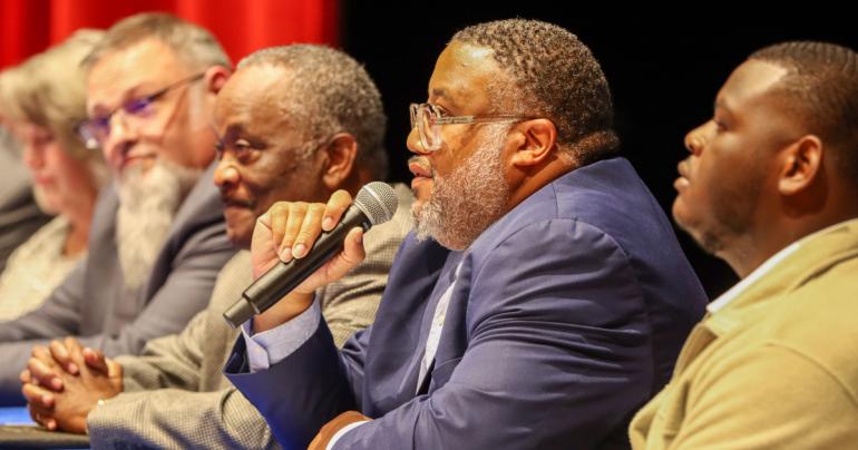 Pastor Franklin Hairston (with microphone) speaks alongside other panelists during the open discussion following the showing of the documentary film “Harriet Tubman: Visions of Freedom” at Glenville State University on October 28. (GSU Photo/Dustin Crutchfield)