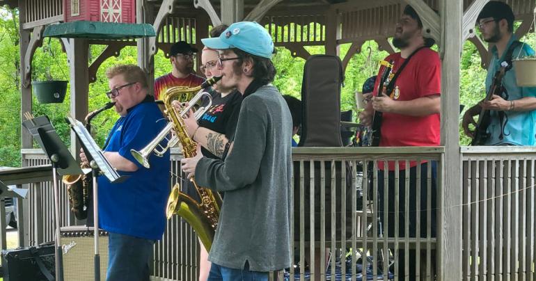 Members of the Glenville State University Jazz Band performing outside the Genesis HealthCare Glenville Center as part of their National Skilled Nursing Care Week recognition activities.
