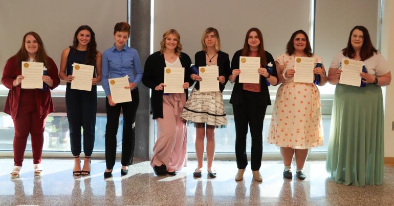 Spring 2022 inductees to Glenville State University’s Kappa Omicron chapter of international education honor society Kappa Delta Pi (l-r) Abigail Taylor, Madison Shepherd, Heather Sears, Emily Lewis, Cameron Knopp, Samantha Hall, Myrtle Copen, and Stormie Alverson. (GSU Photo/Dustin Crutchfield)