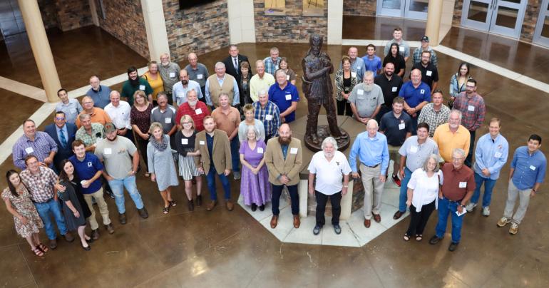 Land Surveying Reunion Attendees Alumni of the Land Surveying Program at Glenville State University join faculty, staff, current students, and other guests for a group photo during the 50th anniversary celebration of the program that was held on September 10. (GSU Photo/Dustin Crutchfield)