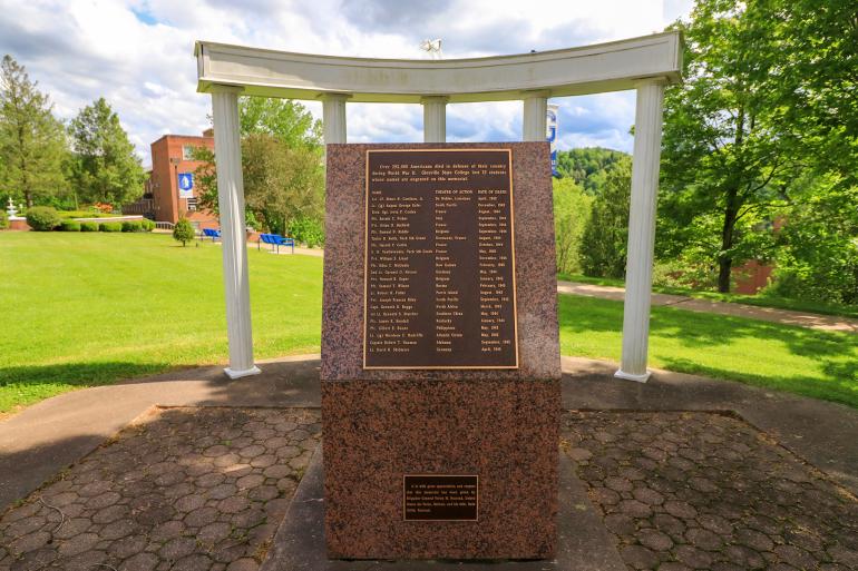 The War Memorial at GSC, situated on Clark Hall Lawn, honors the lives of 23 GSC students who died during World War II (GSC Photo/Kristen Cosner)