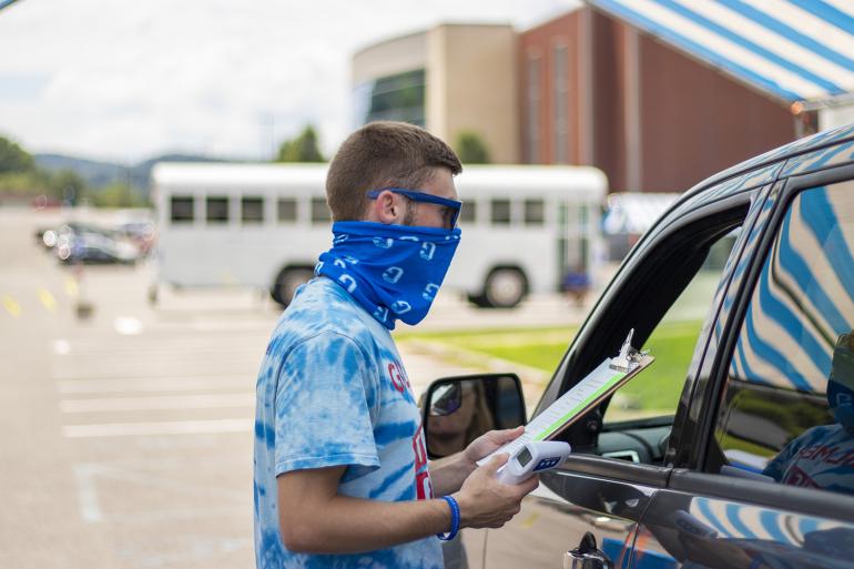 Glenville State Admissions Staff check students in upon arrival Glenville State Admissions Staff check students in upon arrival