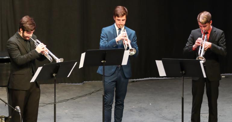 Glenville State University senior music education major Nic McVaney (center) performs at his senior recital with Stephen Smith (left) and Cody Dye (right). (GSU Photo/Dustin Crutchfield)