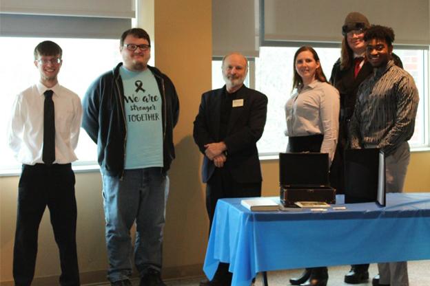 Several Glenville State College PBL representatives with the grand prize raffle winner from their Career Development Workshop. Glenville State student Ethan Veltre (second from left) was the raffle winner. He’s joined here by PBL members (l-r) Wesley Davis, Dr. Gary Arbogast, Sabrina Gonzalez, Jonathan Williams, and Marshawn Kelley. | Photo by Charles E. Gordon II (GP MediaGrp cgordon)