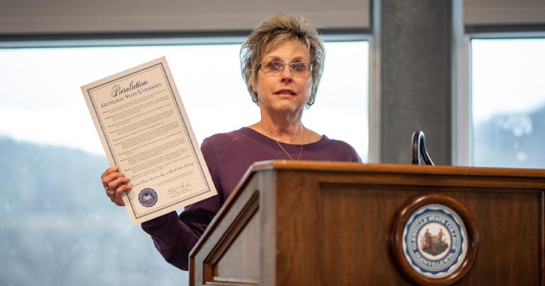 Rita Hedrick-Helmick, Vice President for Administration at Glenville State University, holds a copy of the resolution proclaiming November 30, 2022 as Pancreatic Cancer Awareness Day at Glenville State University. (GSU Photo/Kristen Cosner)