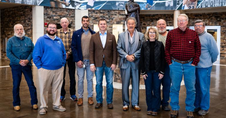 (l-r) Chester Shoals, Cody Moore, Rick Sypolt, Charlie Warino, Jason Harshbarger, Dr. Mark Manchin, Jane Cain, Tom Snyder, Bud Sponaugle, and Pat Nestor inside the Waco Center at Glenville State University. Warino and Harshbarger were on hand to present a $5,000 donation from BHE GT&S for the Pioneer Nature Trail. (GSU Photo/Kristen Cosner)