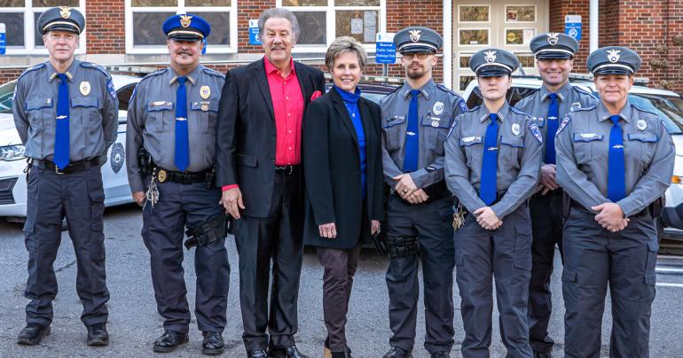 Glenville State University Public Safety staff in their new uniforms. Pictured (l-r) Administrative Chief W.D. Boone, Chief M.J. Wheeler, GSU President Dr. Mark Manchin, GSU Vice President for Administration Rita Hedrick-Helmick, Police Officer B.S. Benson, Security Guard D.A. Yoho, Police Officer A.M. Gissy, and Security Guard A.D. Stoddard. (GSU Photo/Kristen Cosner)