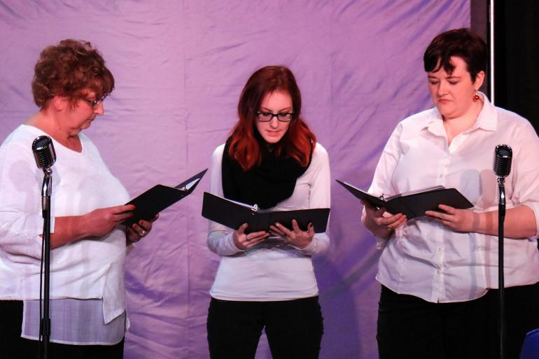(l-r) Dr. Kathleen Nelson, Brittany Benson, and Dr. Kaitlin Ensor participate in the Reader's Theater performance of A Christmas Carol