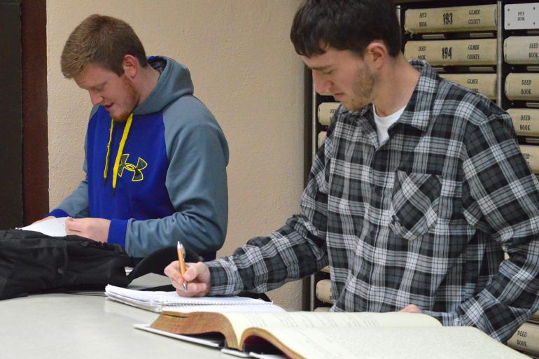 Glenville State College students conduct courthouse research as part of a Land Titles and Abstracting course Glenville State College students conduct courthouse research as part of a Land Titles and Abstracting course