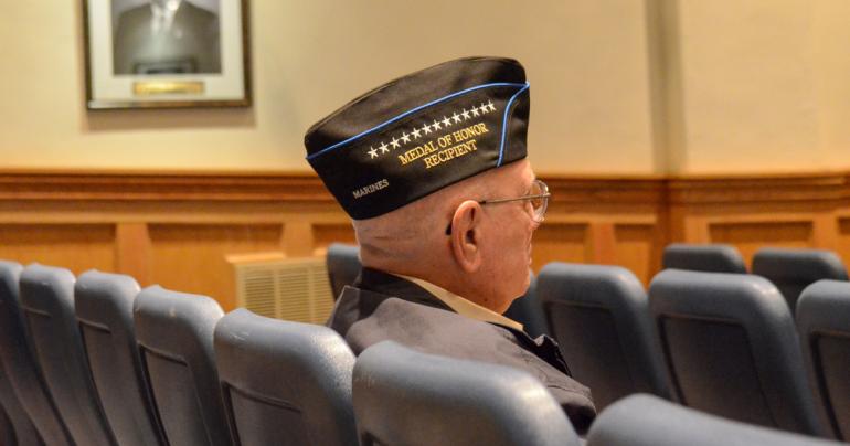 Woody Williams seated in the Glenville State University President’s Auditorium during a visit to campus in 2012. (GSU Photo/Mark Romano)