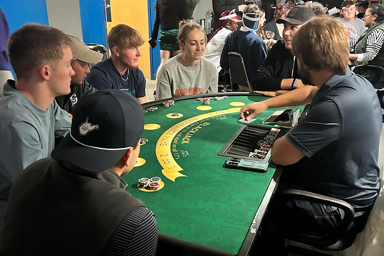 Students play Blackjack at Casion Night