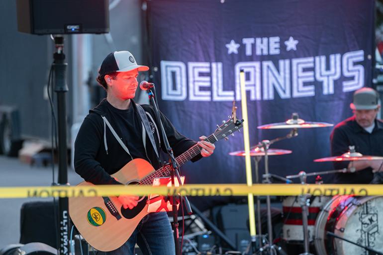 The Delaneys perform at a concert for students