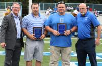 Rob Smith and Jimmy Mullins accept the Halftime Heros award