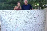 Dr. Megan Darby being presented the Bean Blossom Wall of Fame at the 45th Annual Bill Monroe Memorial Bluegrass Festival in 2012