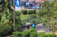 Students walk through campus between classes