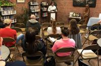 Dr. Jonathan Minton reads from his book of poetry at a previous Celebration of Words event
