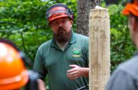 West Virginia Division of Forestry Forester Johnny King discusses cutting technique and chainsaw safety with Glenville State University students during a recent workshop. (GSU Photo/Dustin Crutchfield)