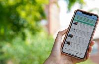 The Clio smartphone app displays a few of the historic entries around the Glenville area, including the Glenville State College Clock Tower which is pictured in the background. (GSC Photo/Kristen Cosner)