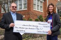 Chris Arden, Chief Financial Officer and Senior Vice President at Calhoun Banks, joins Glenville State University’s Director of Fundraising Vada Woodford for a check presentation. Calhoun Banks was among the 800+ donors who contributed to Glenville State’s annual Founders Day of Giving. (GSU Photo/Dustin Crutchfield)