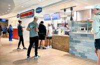 Students wait to pick up their orders at the newly opened Cedar Creek Grill inside the Mollohan Campus Community Center at Glenville State University. (GSU Photo/Kristen Cosner)