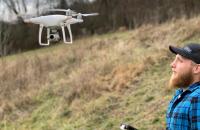 GSC student Jacob Petry flies a drone outside the GSC Department of Land Resources classrooms at the Waco Center