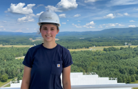 Glenville State College graduate Emma Yokum on the job as Safety Officer at the Green Bank Observatory, pictured here 450 feet up on the receiver deck of the Green Bank Telescope | Photo Courtesy of NSF, Green Bank Observatory