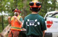 A Glenville State College forestry student listens as instructions are shared by a WV Division of Forestry employee. (GSC Photo/Kristen Cosner)