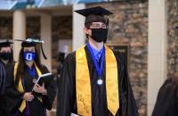 Prospective Glenville State College graduates exit the Waco Center following the Commencement Ceremony held on Saturday, November 21 (GSC Photo/Kristen Cosner)